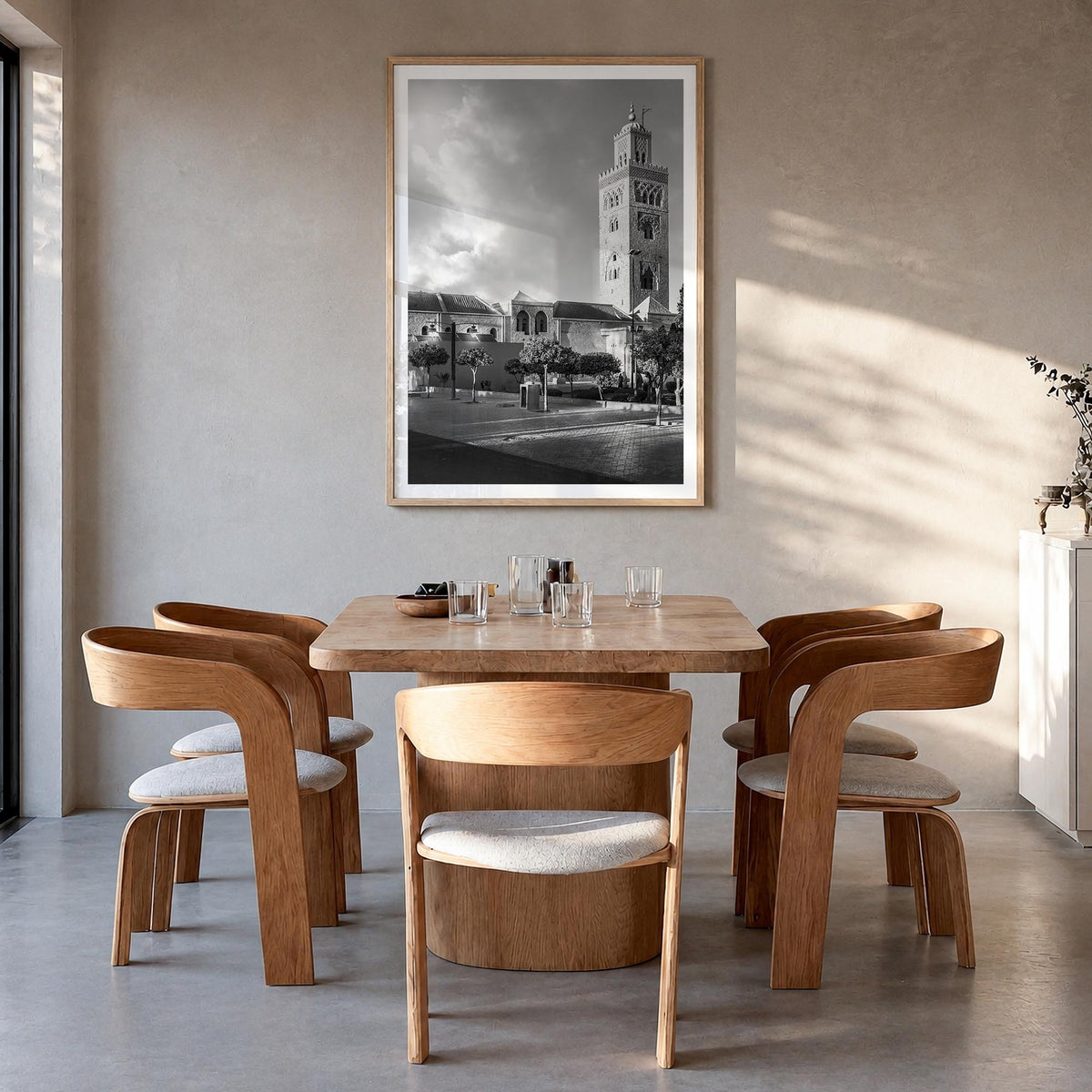 Marrakesh black & white photo poster of Morocco – vertical wall art in natural wood frame with white border, hanging on wall