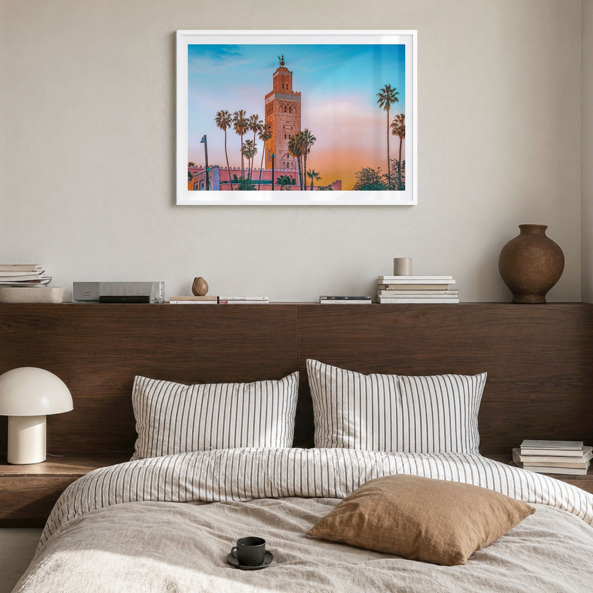 Marrakesh Photo Poster in a white wood frame, hanging in a bedroom, white border
