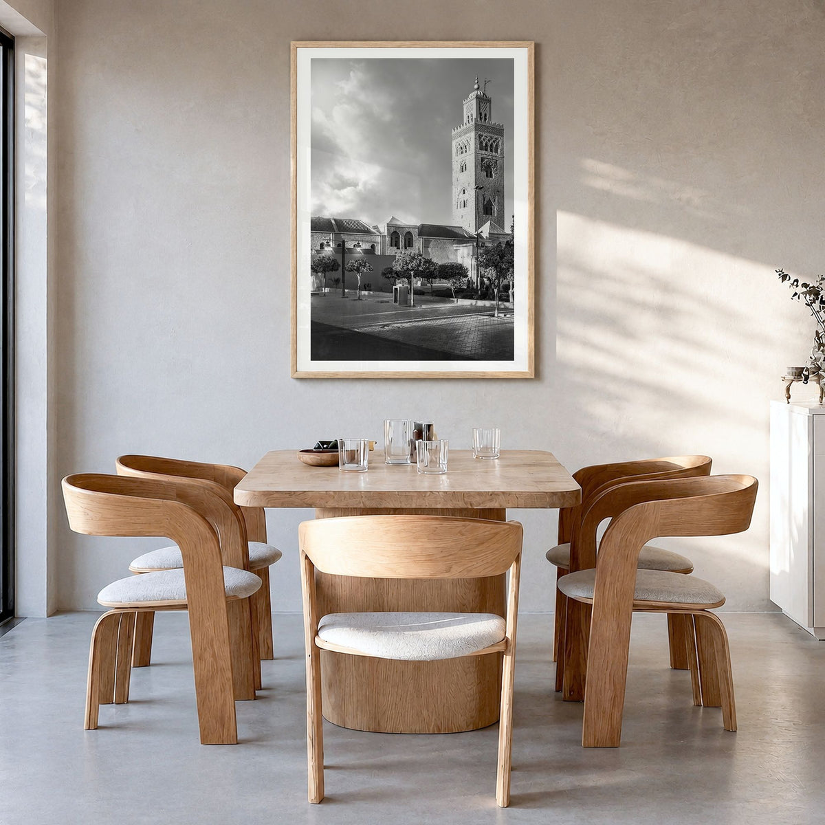 Marrakesh Photo Poster in a natural wood frame, hanging in a dining room, white border