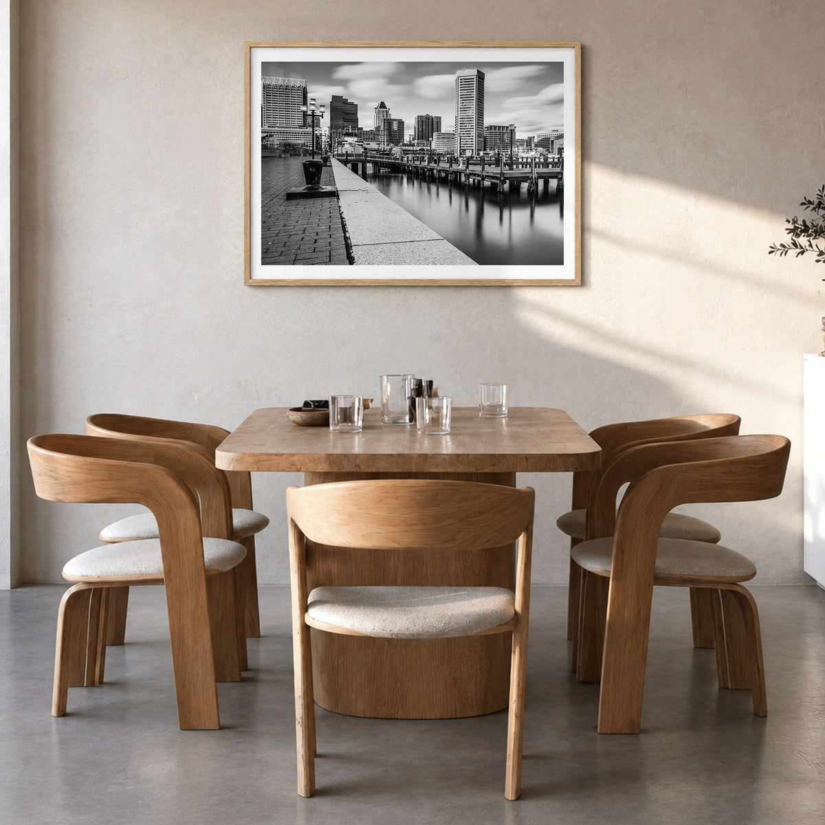 Maryland Photo Poster in a natural wood frame, hanging in a dining room, white border