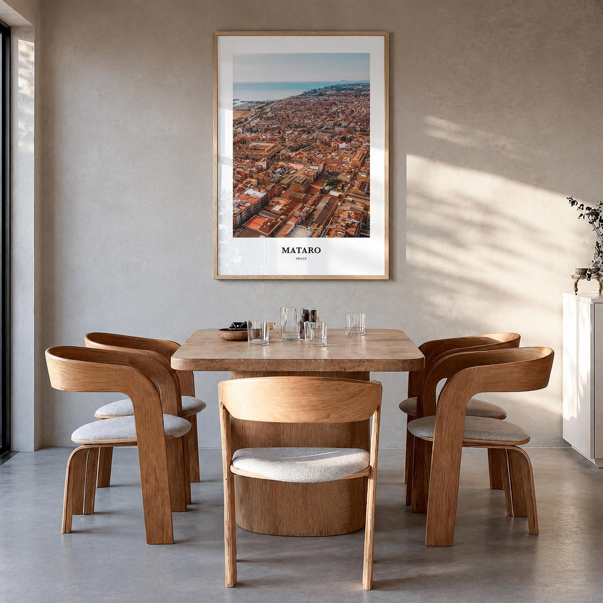 Mataró colorful classic poster of Spain – vertical wall art in natural wood frame, hanging on wall