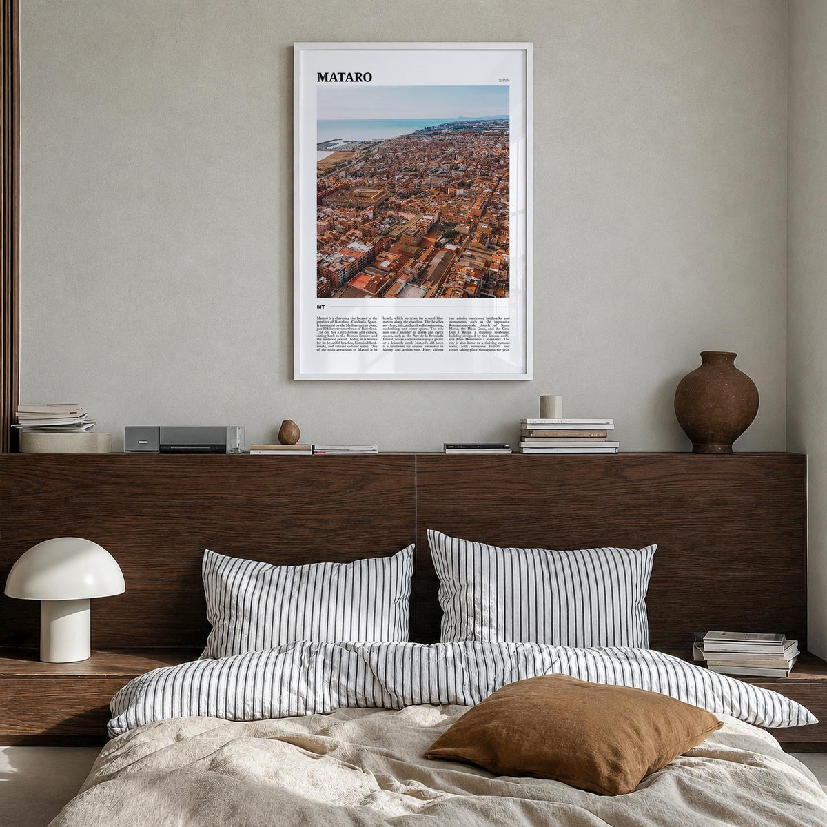 Mataró colorful travel poster of Spain – vertical wall art in white wood frame, hanging on wall