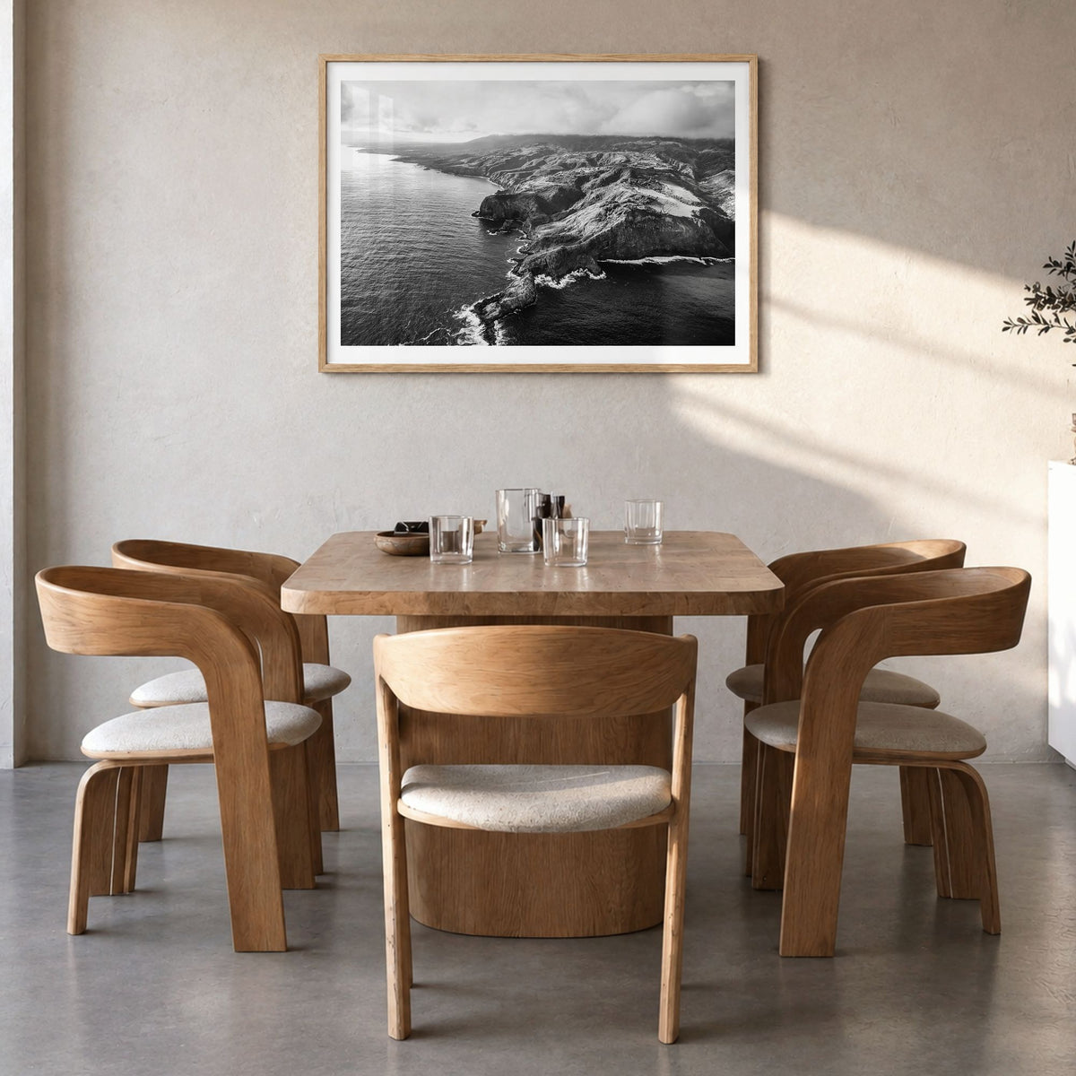 Maui Photo Poster in a natural wood frame, hanging in a dining room, white border