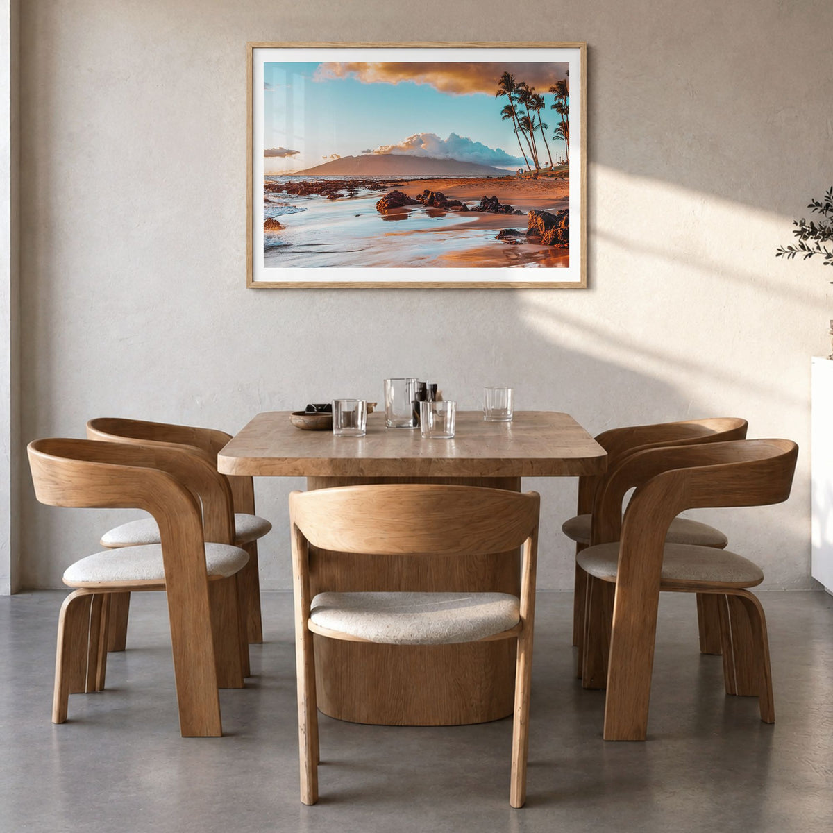 Maui Photo Poster in a natural wood frame, hanging in a dining room, white border