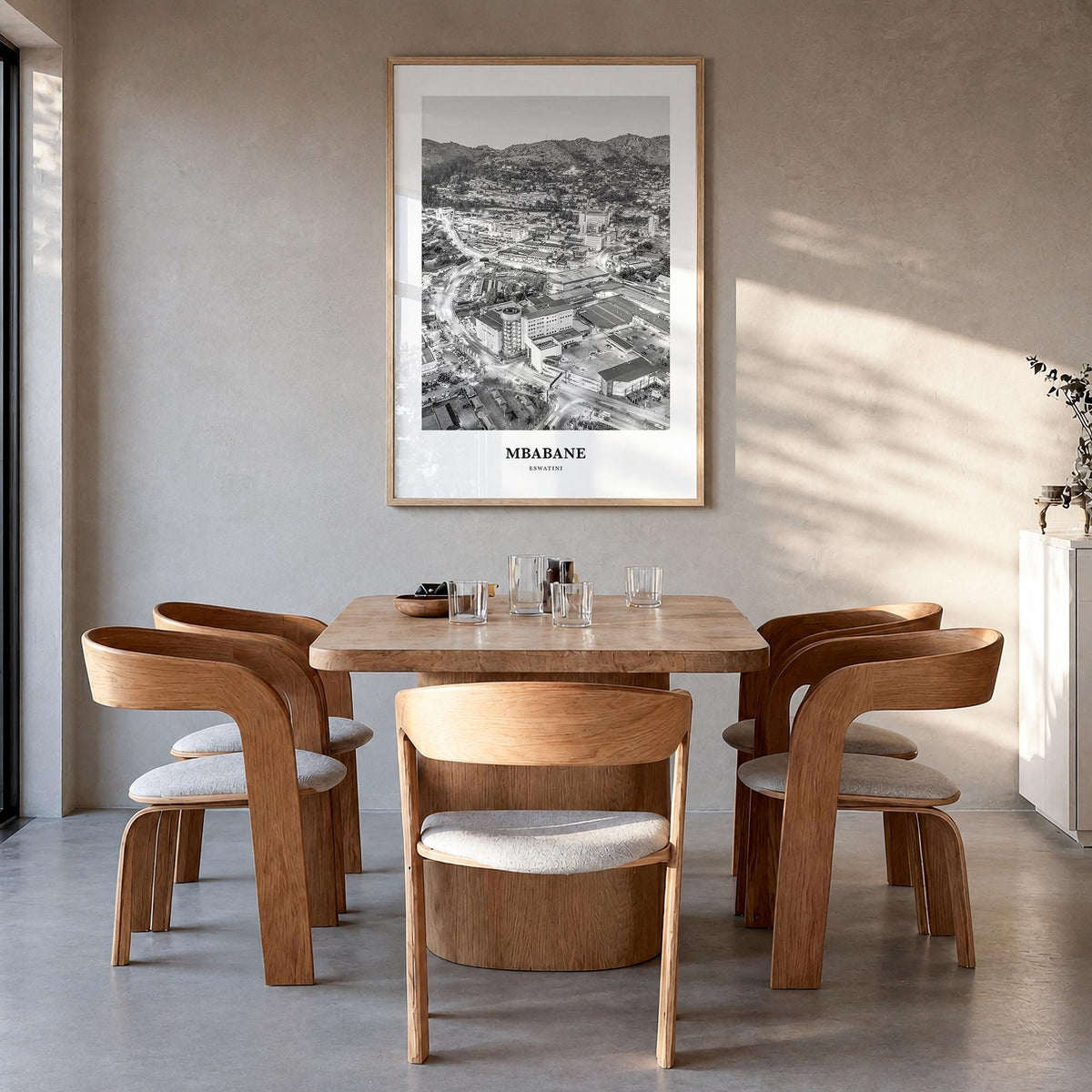 Mbabane black & white classic poster of Eswatini – vertical wall art in natural wood frame, hanging on wall