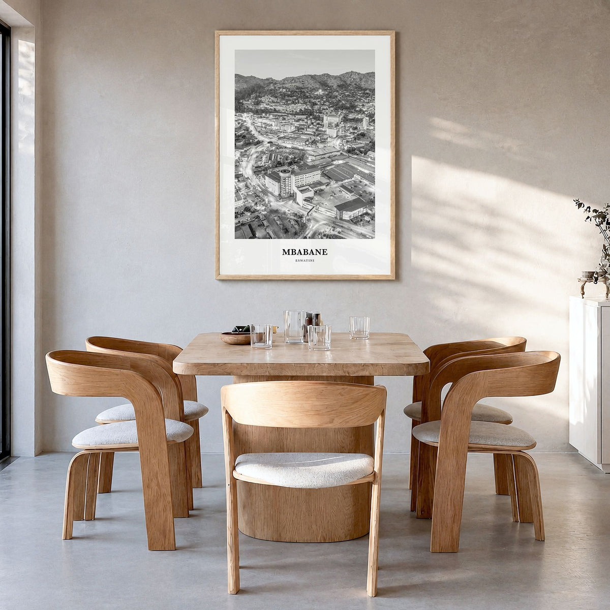 Mbabane Classic Poster in a natural wood frame, hanging in a dining room