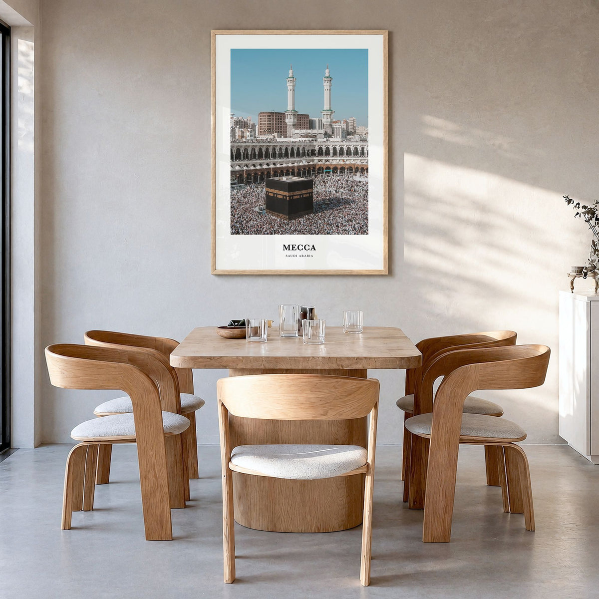 Mecca Classic Poster in a natural wood frame, hanging in a dining room