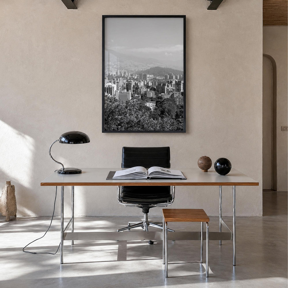 Medellín black & white photo poster of Colombia – vertical wall art in black wood frame, hanging on wall