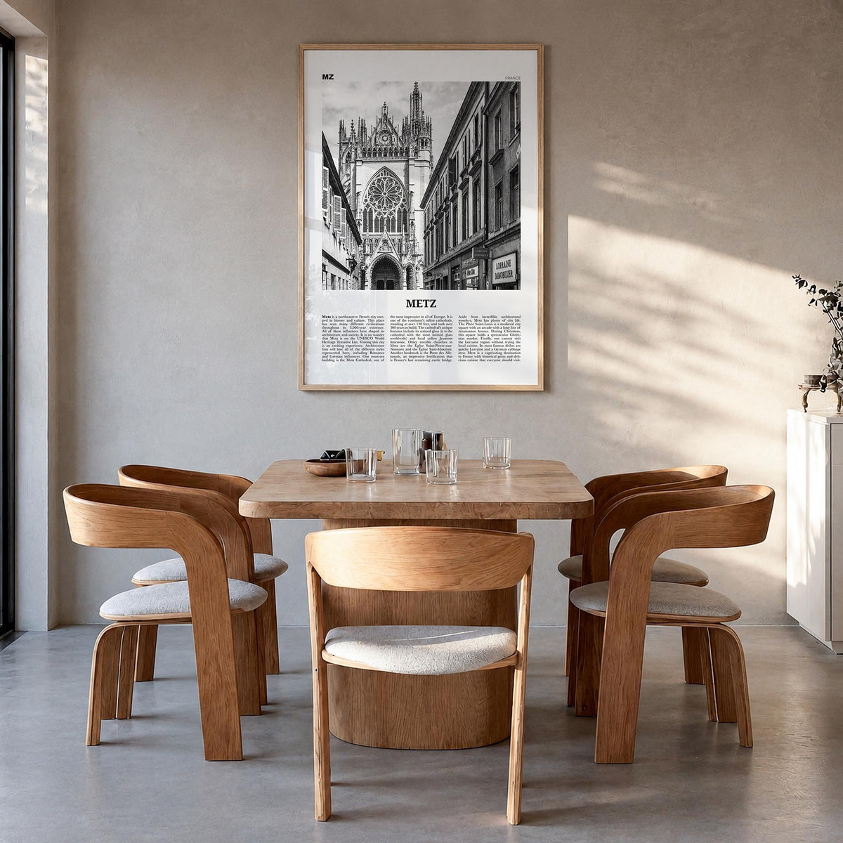 Metz black & white newspaper poster of France – vertical wall art in natural wood frame, hanging on wall