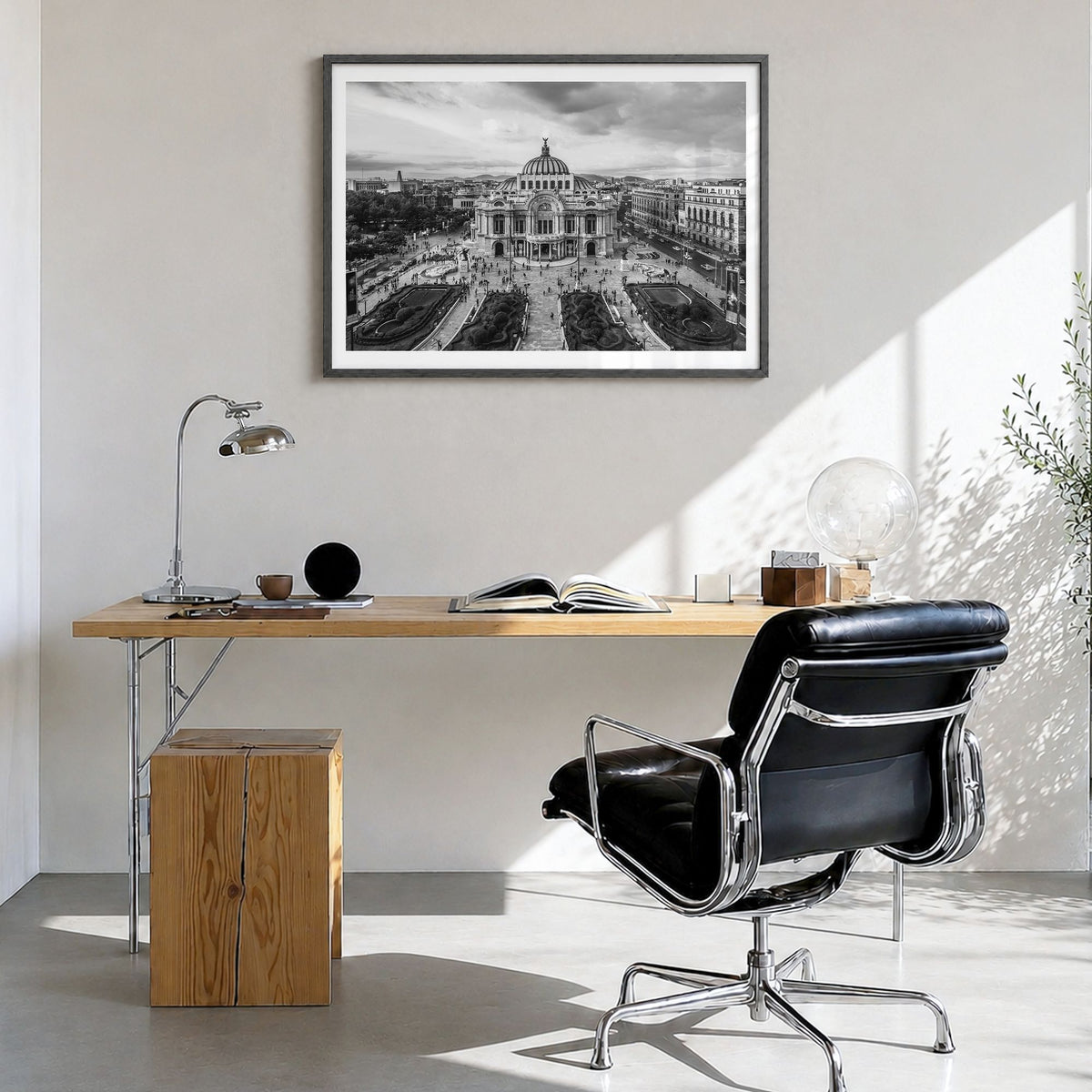 Mexico City Photo Poster in a black wood frame, hanging in a bright home office, white border