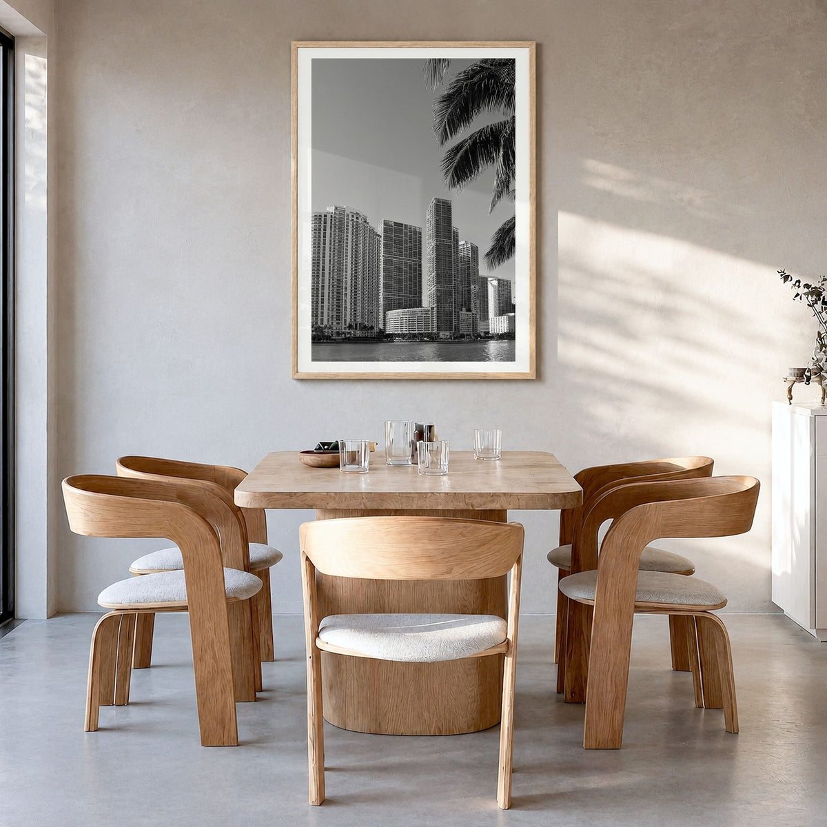Miami Photo No 1 Poster in a natural wood frame, hanging in a dining room, white border