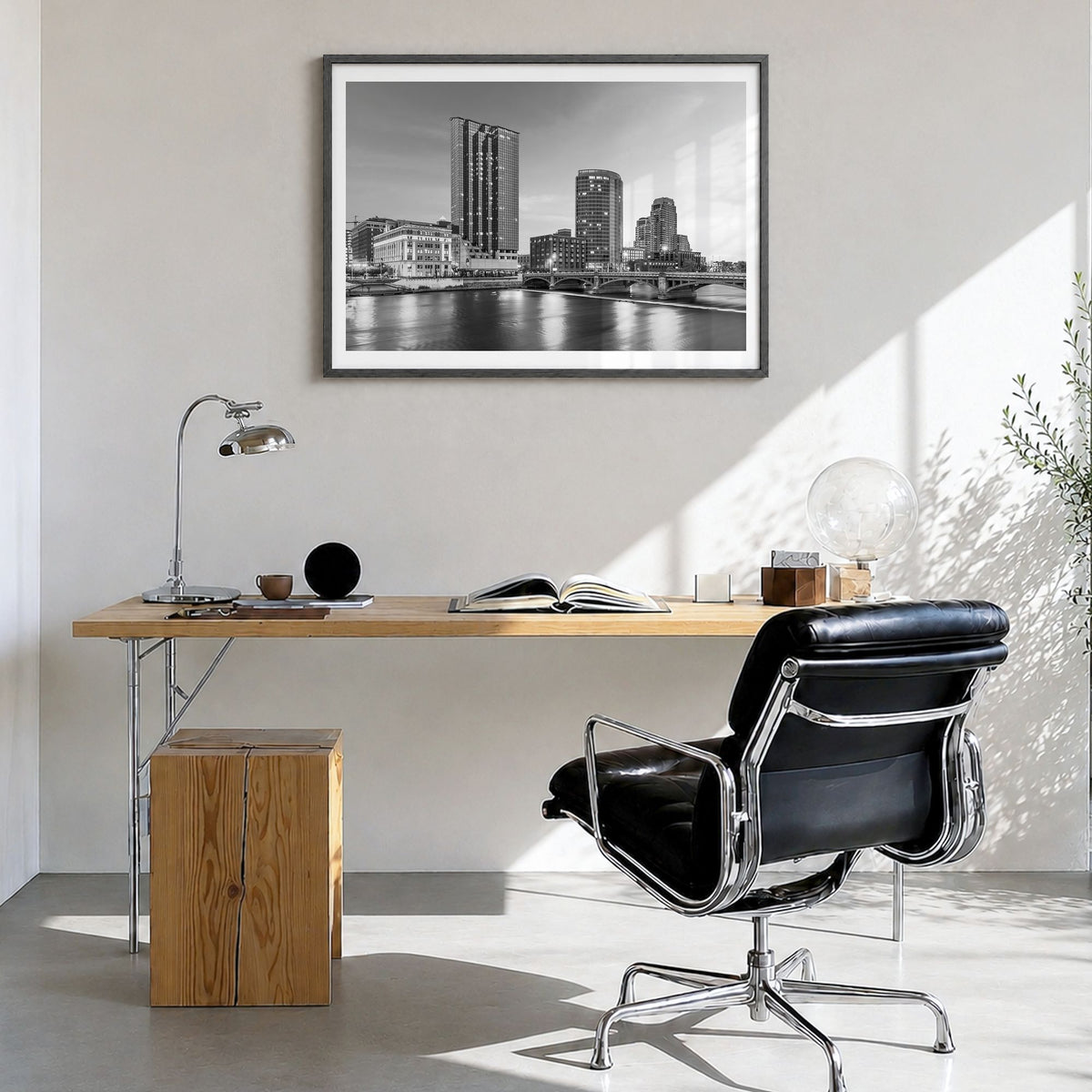 Michigan Photo Poster in a black wood frame, hanging in a bright home office, white border