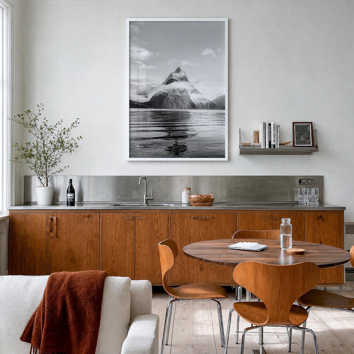 Milford Sound black & white photo poster of New Zealand – vertical wall art in white wood frame, hanging on wall