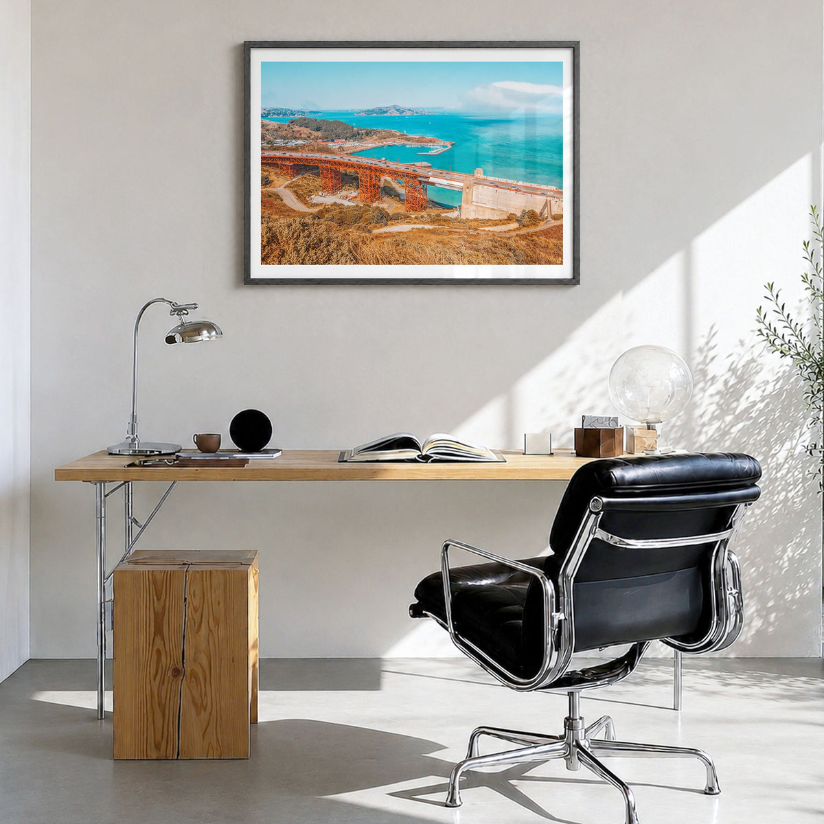 Mill Valley Photo Poster in a black wood frame, hanging in a bright home office, white border