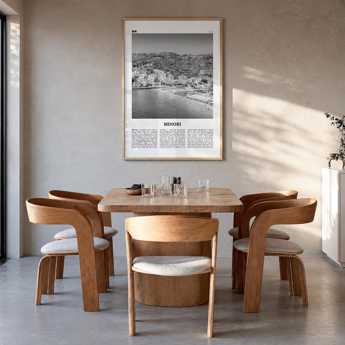 Minori black & white newspaper poster of Italy – vertical wall art in natural wood frame, hanging on wall