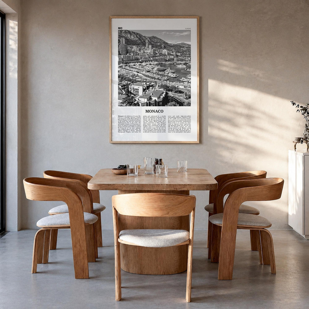 Monaco black & white newspaper poster of Europe – vertical wall art in natural wood frame, hanging on wall