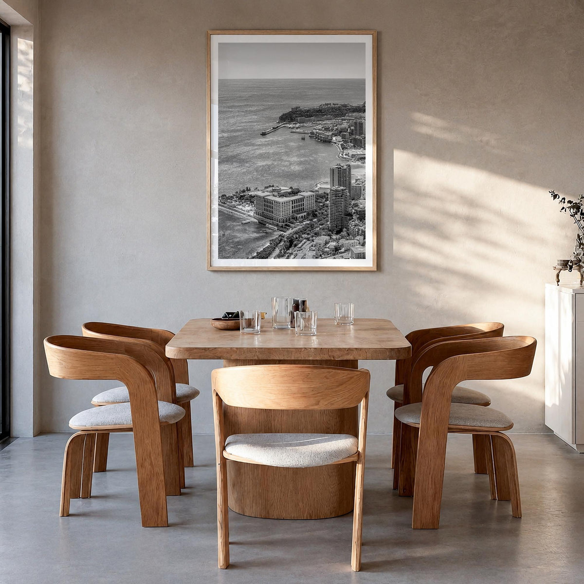 Monaco black & white photo poster of Europe – vertical wall art in natural wood frame with white border, hanging on wall