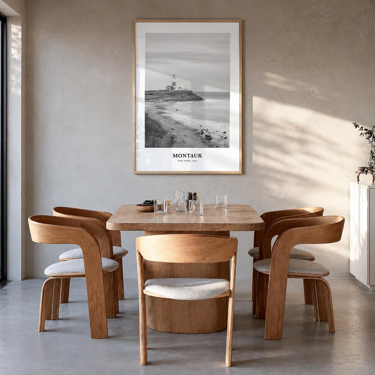 Montauk no. 1 black & white classic poster of New York, USA – vertical wall art in natural wood frame, hanging on wall