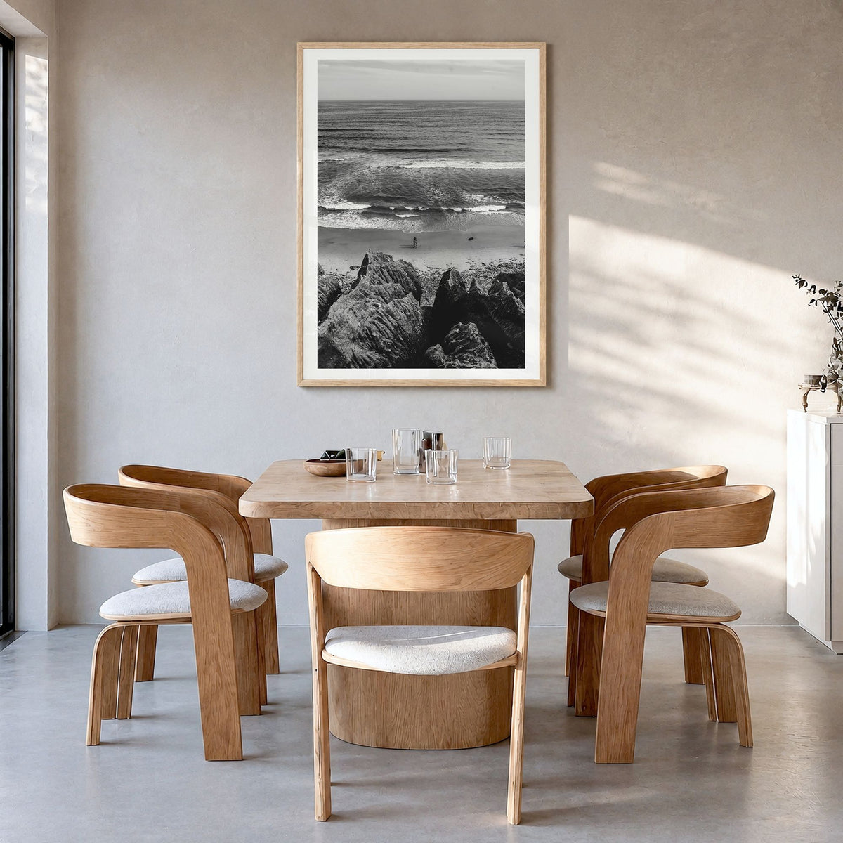Montauk Photo No 1 Poster in a natural wood frame, hanging in a dining room, white border