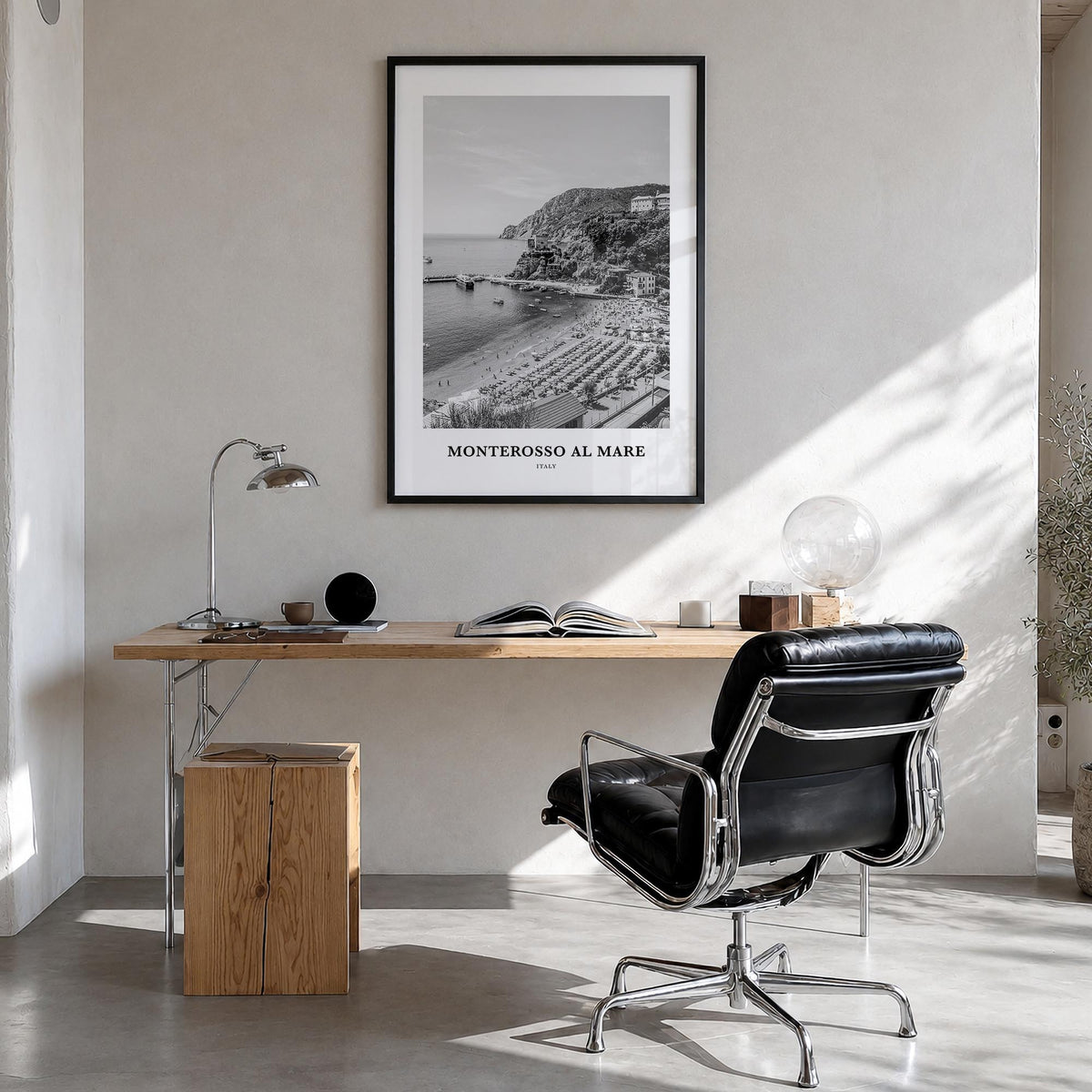 Monterosso al Mare black & white classic poster of Italy – vertical wall art in black wood frame, hanging on wall