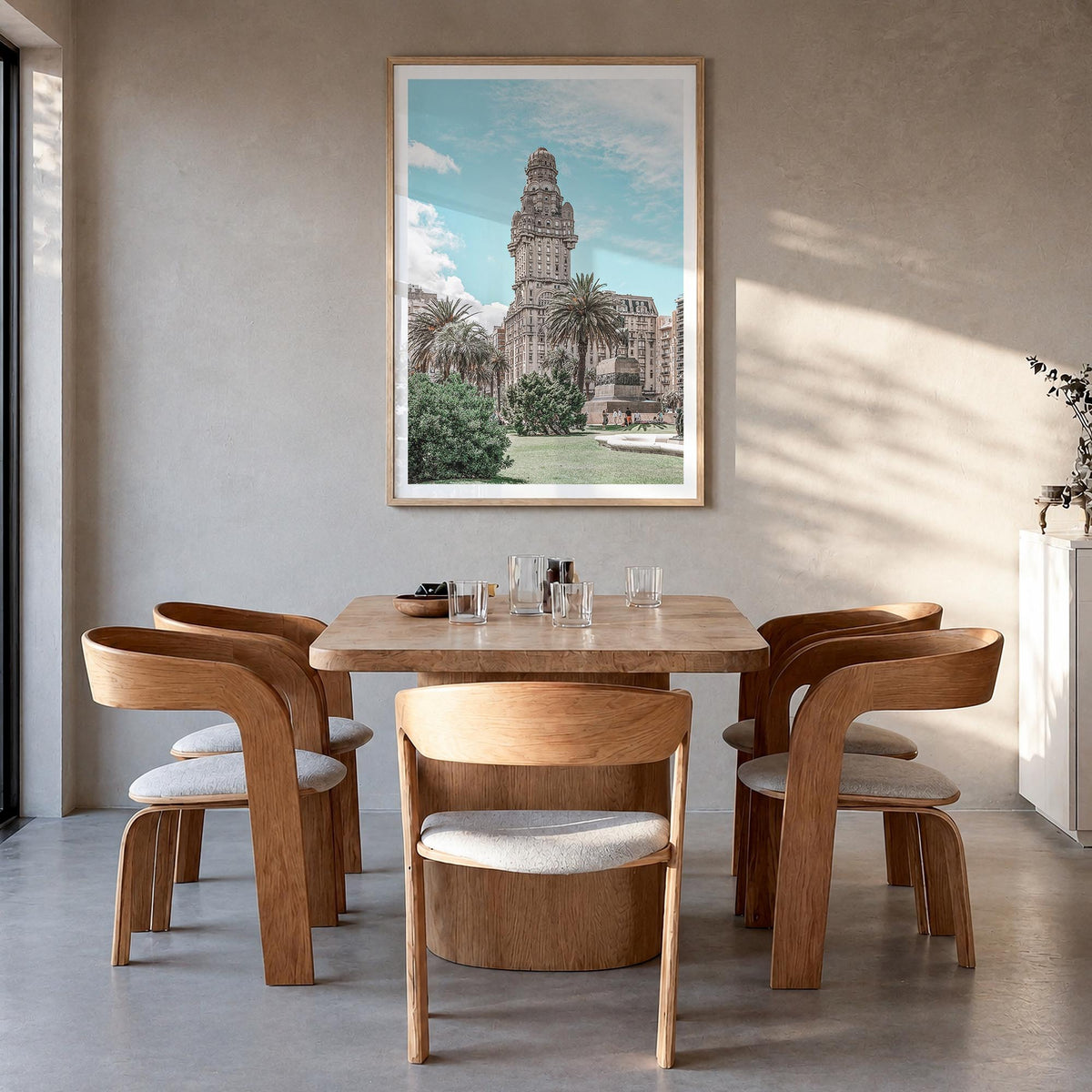 Montevideo colorful photo poster of Uruguay – vertical wall art in natural wood frame with white border, hanging on wall