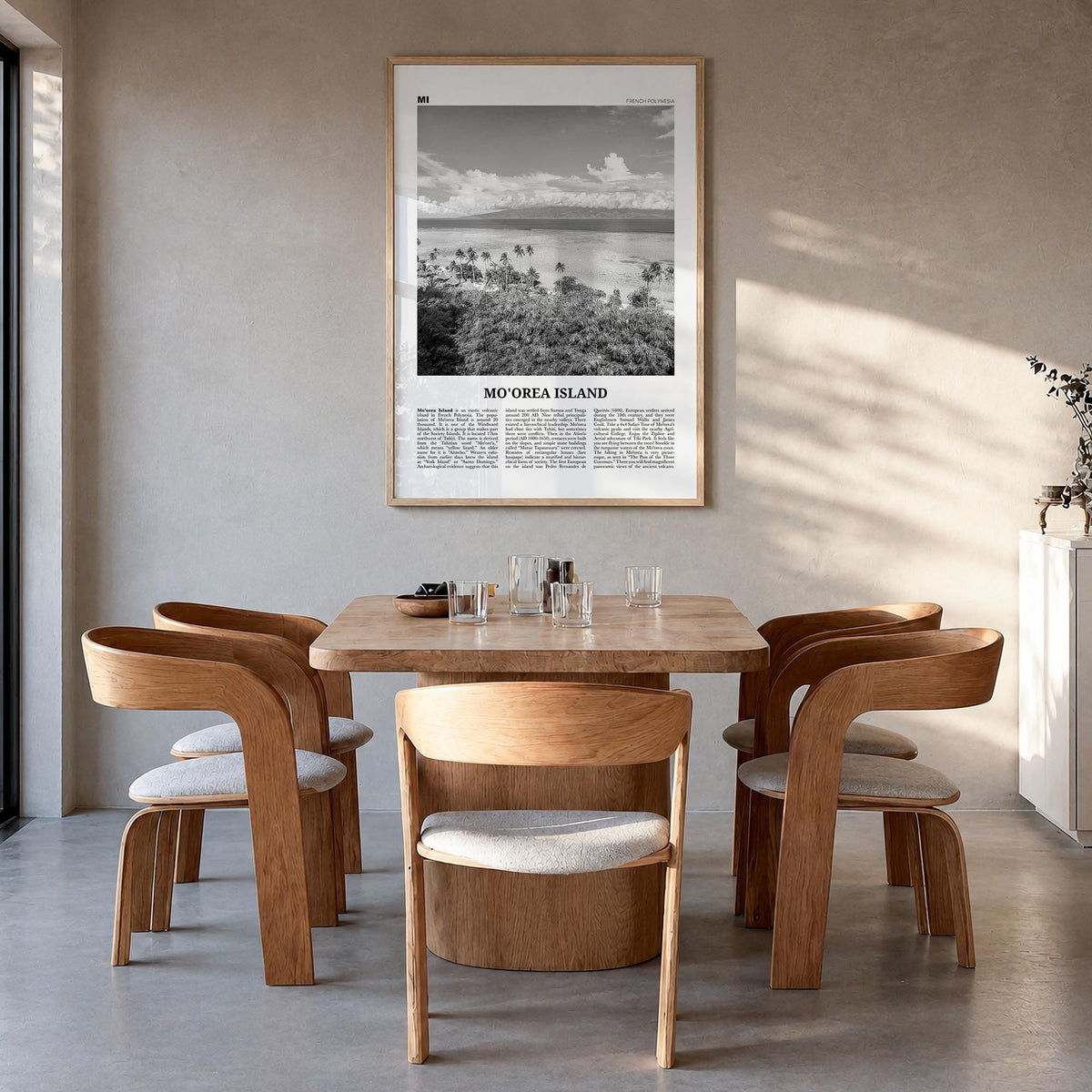 Moorea Island black & white newspaper poster of French Polynesia – vertical wall art in natural wood frame, hanging on wall