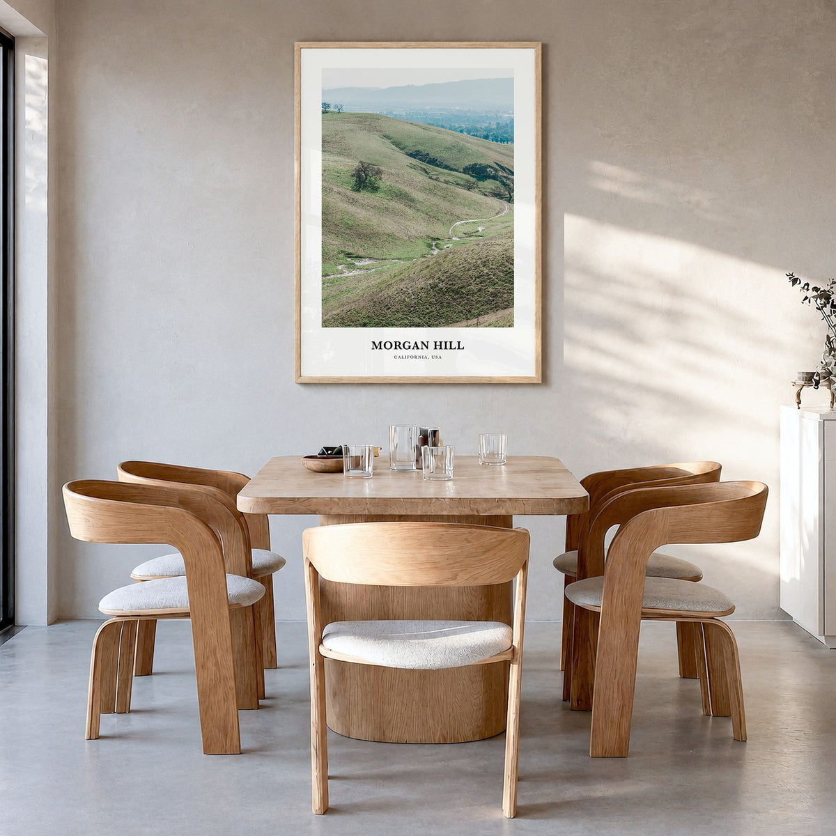 Morgan Hill Classic Poster in a natural wood frame, hanging in a dining room