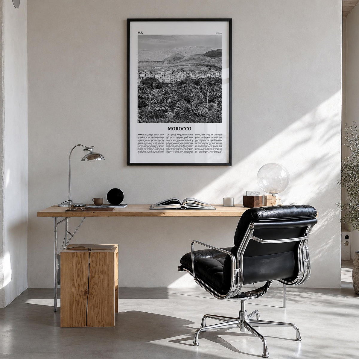 Morocco black & white newspaper poster of Africa – vertical wall art in black wood frame, hanging on wall