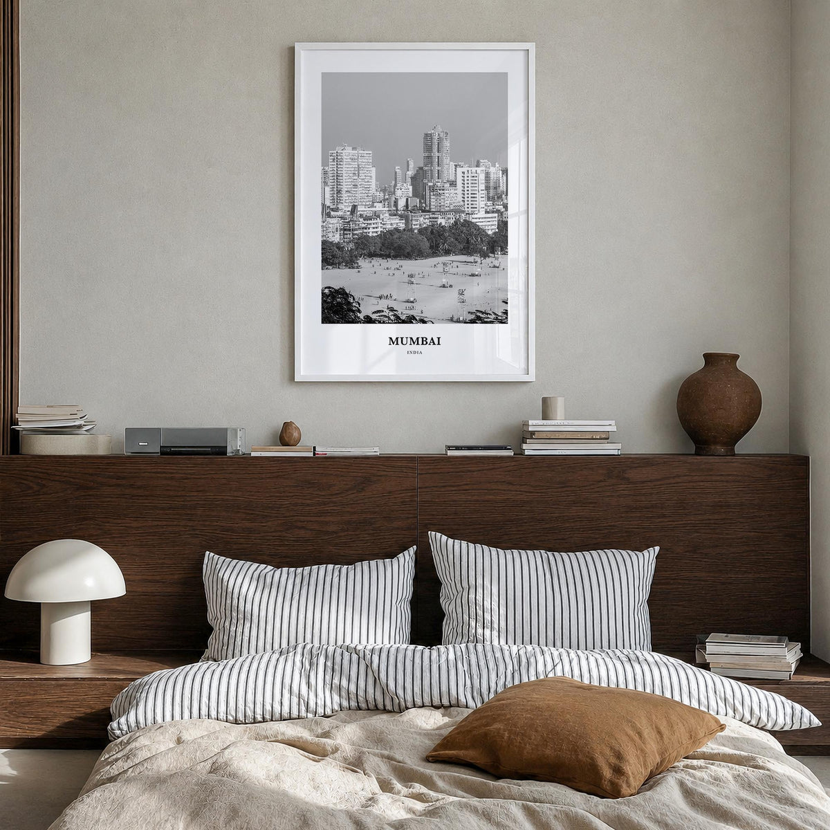 Mumbai black & white classic poster of India – vertical wall art in white wood frame, hanging on wall