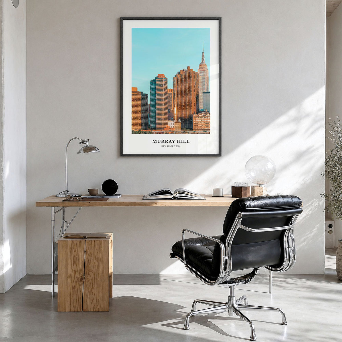 Murray Hill Classic Poster in a black wood frame, hanging in a bright home office