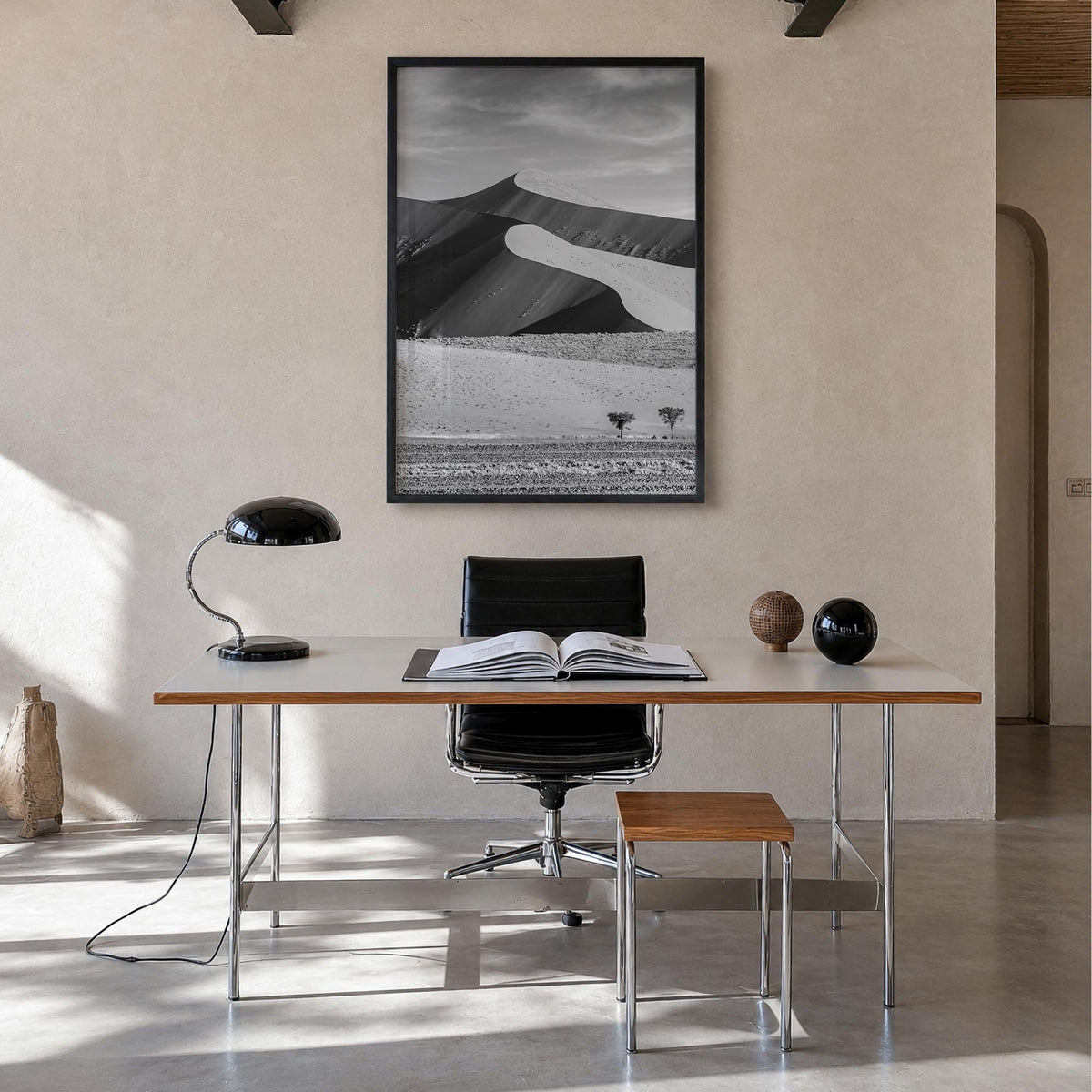 Namibia black & white photo poster of Africa – vertical wall art in black wood frame, hanging on wall
