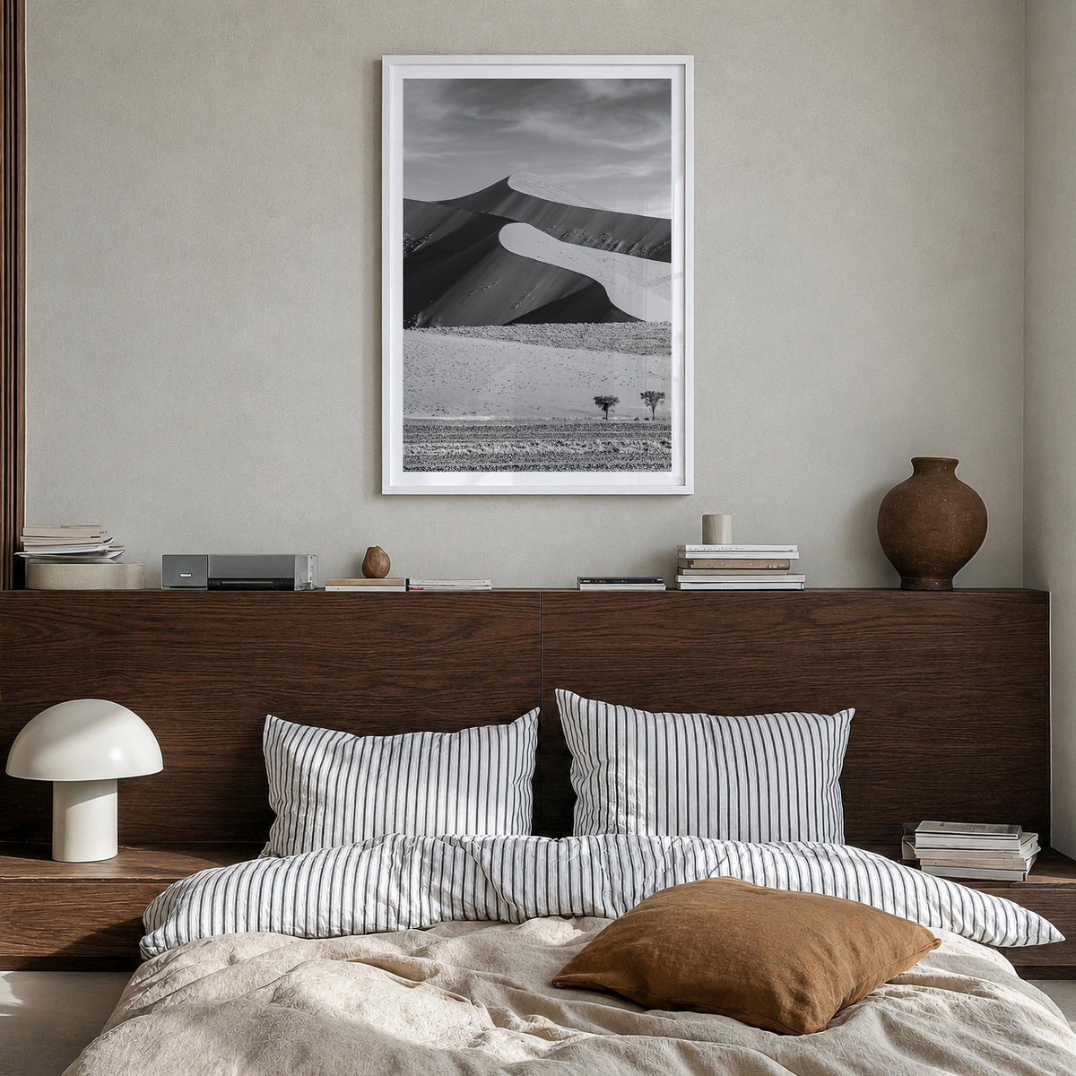 Namibia black & white photo poster of Africa – vertical wall art in white wood frame with white border, hanging on wall