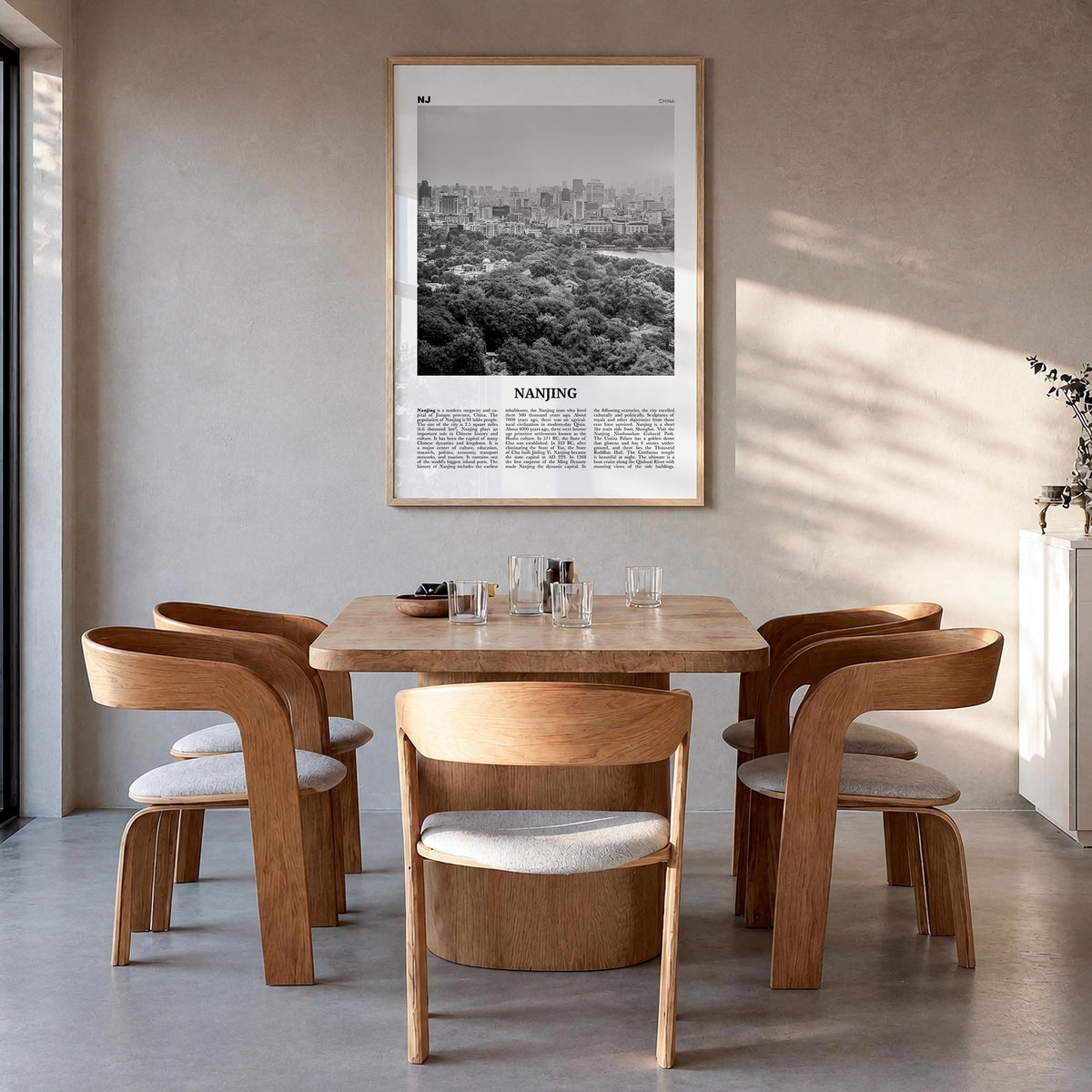 Nanjing black & white newspaper poster of China – vertical wall art in natural wood frame, hanging on wall