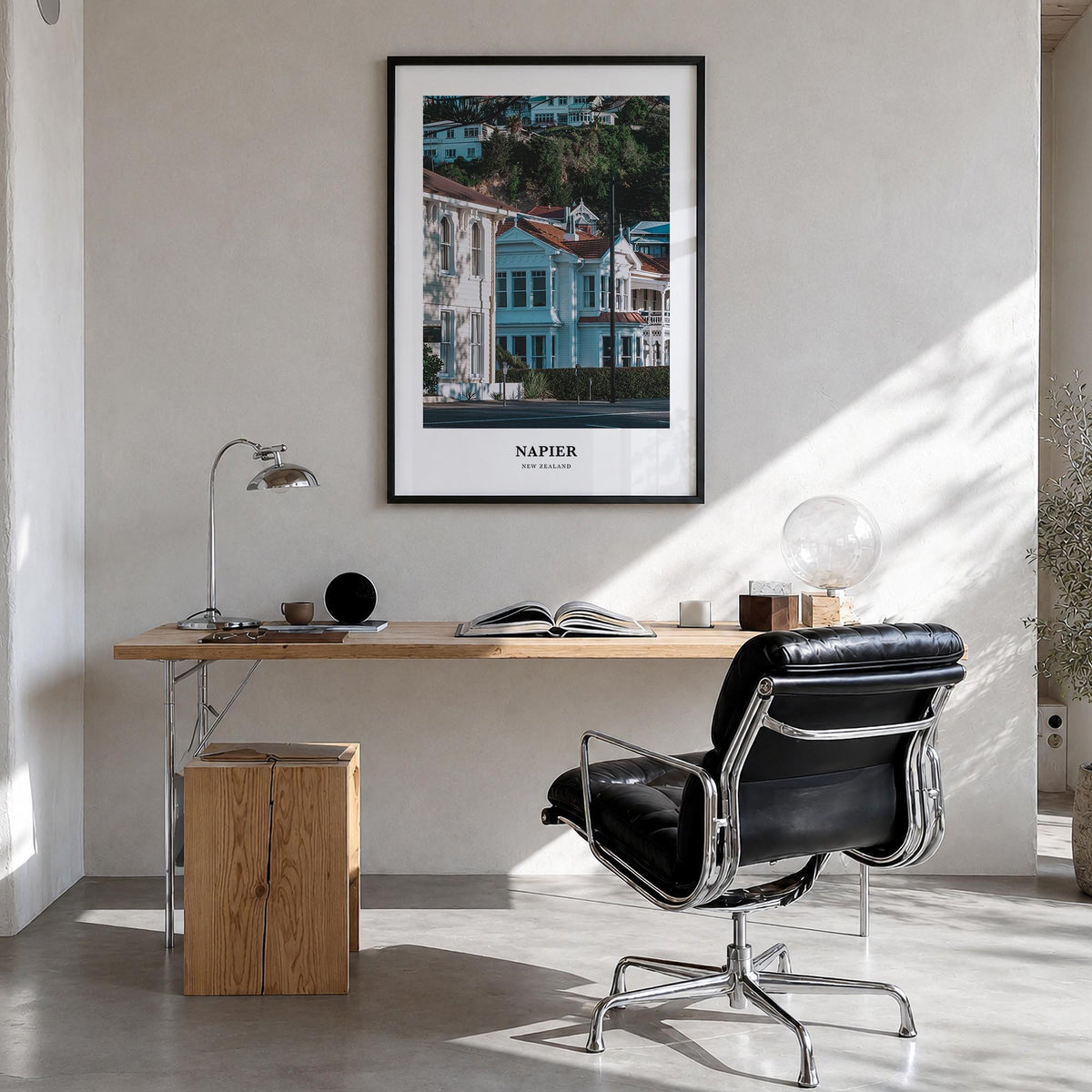 Napier colorful classic poster of New Zealand – vertical wall art in black wood frame, hanging on wall