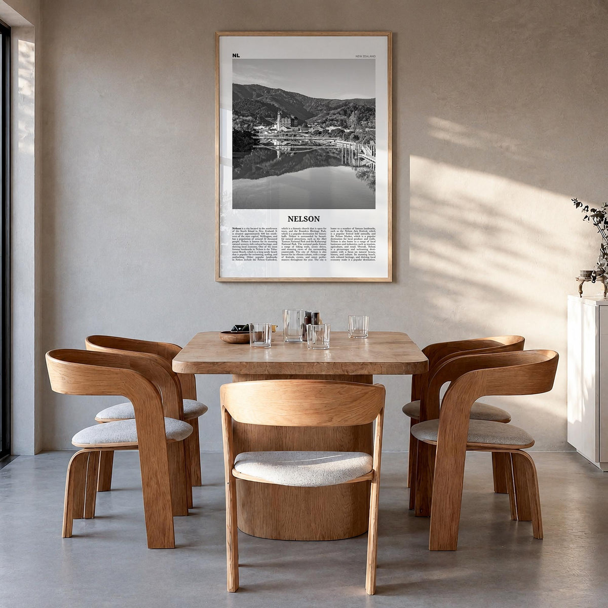 Nelson black & white newspaper poster of New Zealand – vertical wall art in natural wood frame, hanging on wall