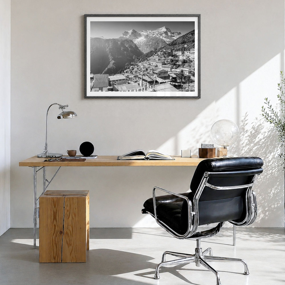 Nepal Photo Poster in a black wood frame, hanging in a bright home office, white border