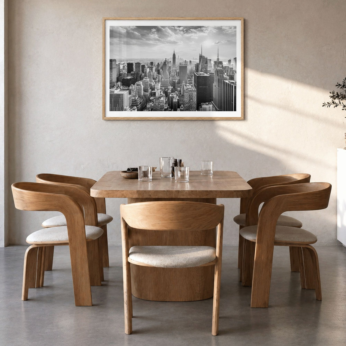 New York City Photo No 1 Poster in a natural wood frame, hanging in a dining room, white border