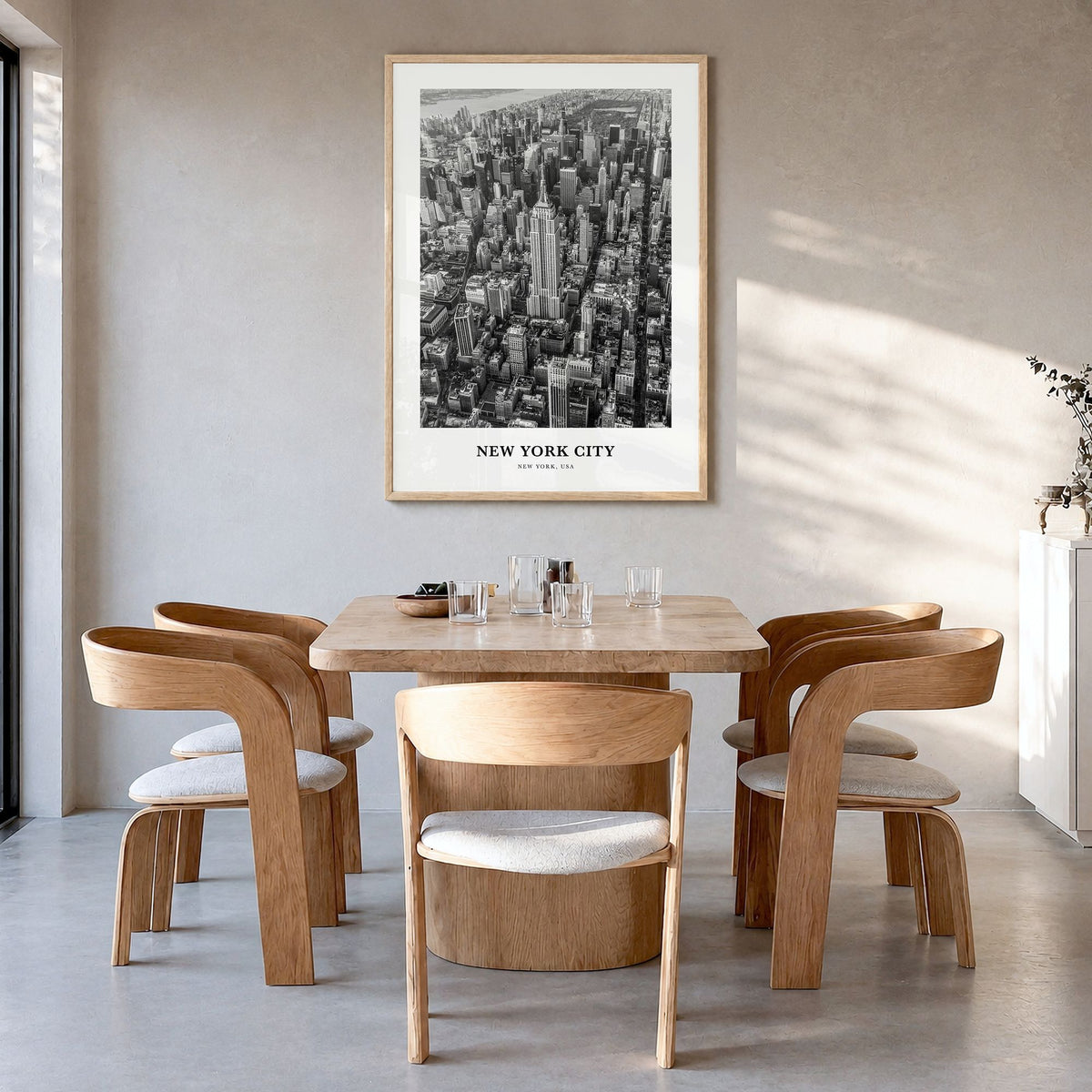 New York City Classic No 2 Poster in a natural wood frame, hanging in a dining room