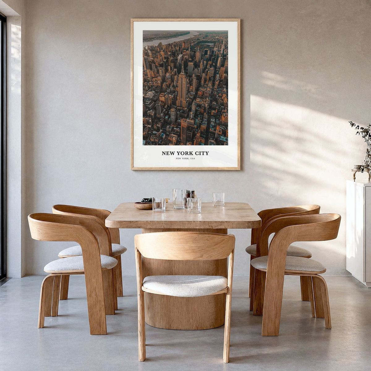 New York City Classic No 3 Poster in a natural wood frame, hanging in a dining room
