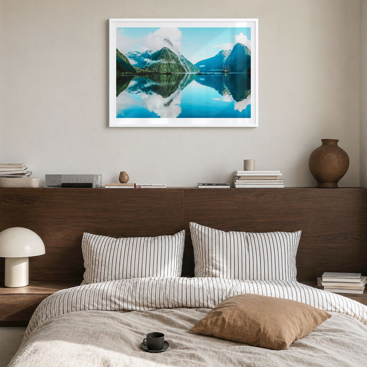 New Zealand Photo Poster in a white wood frame, hanging in a bedroom, white border