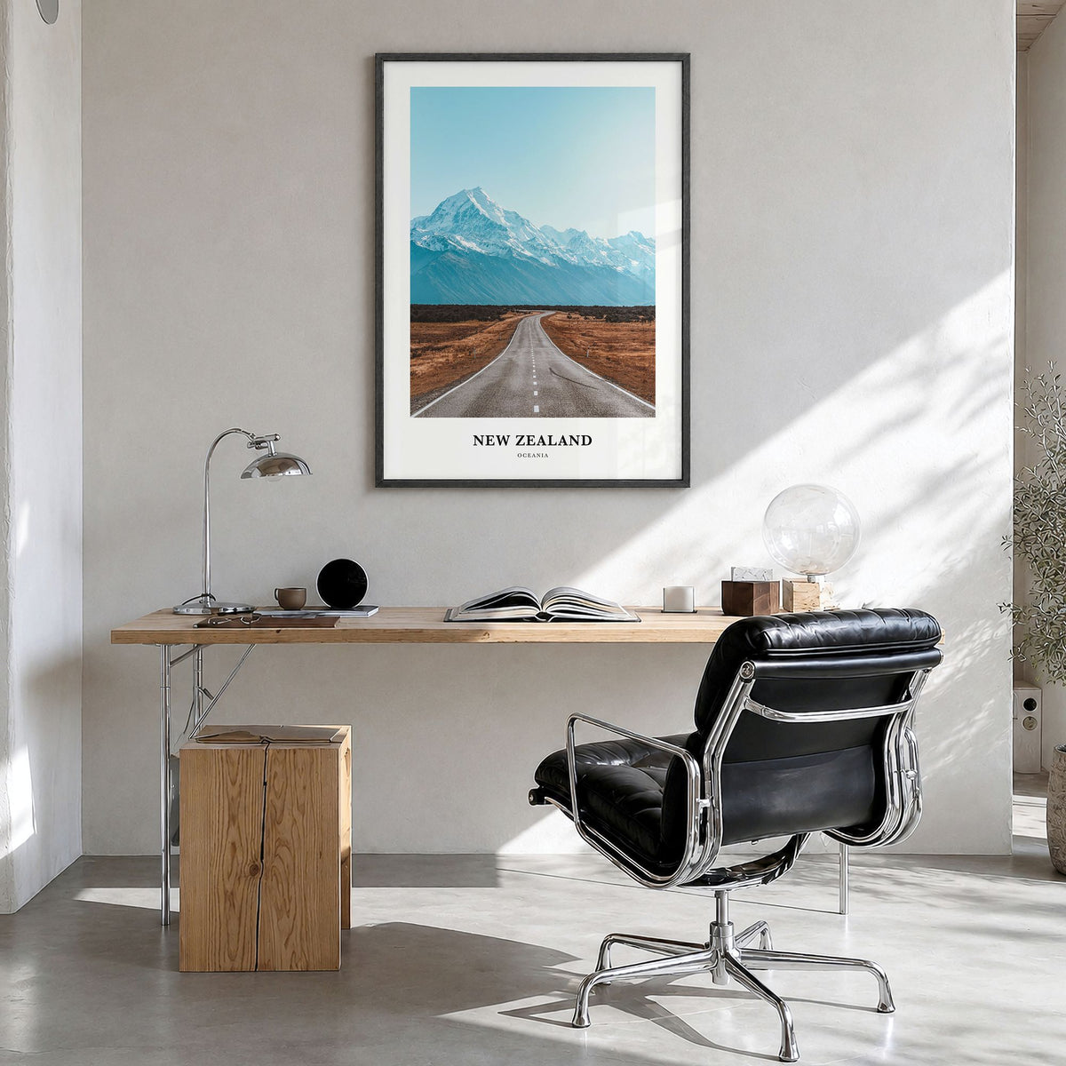 New Zealand Classic Poster in a black wood frame, hanging in a bright home office