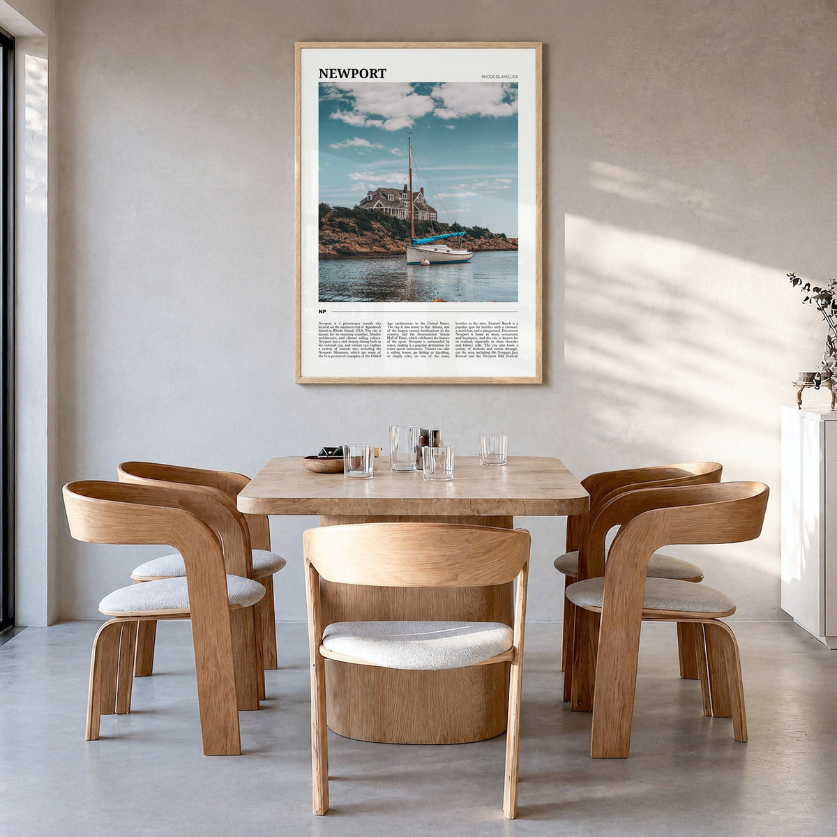 Newport, Rhode Island Travel Poster in a natural wood frame, hanging in a dining room
