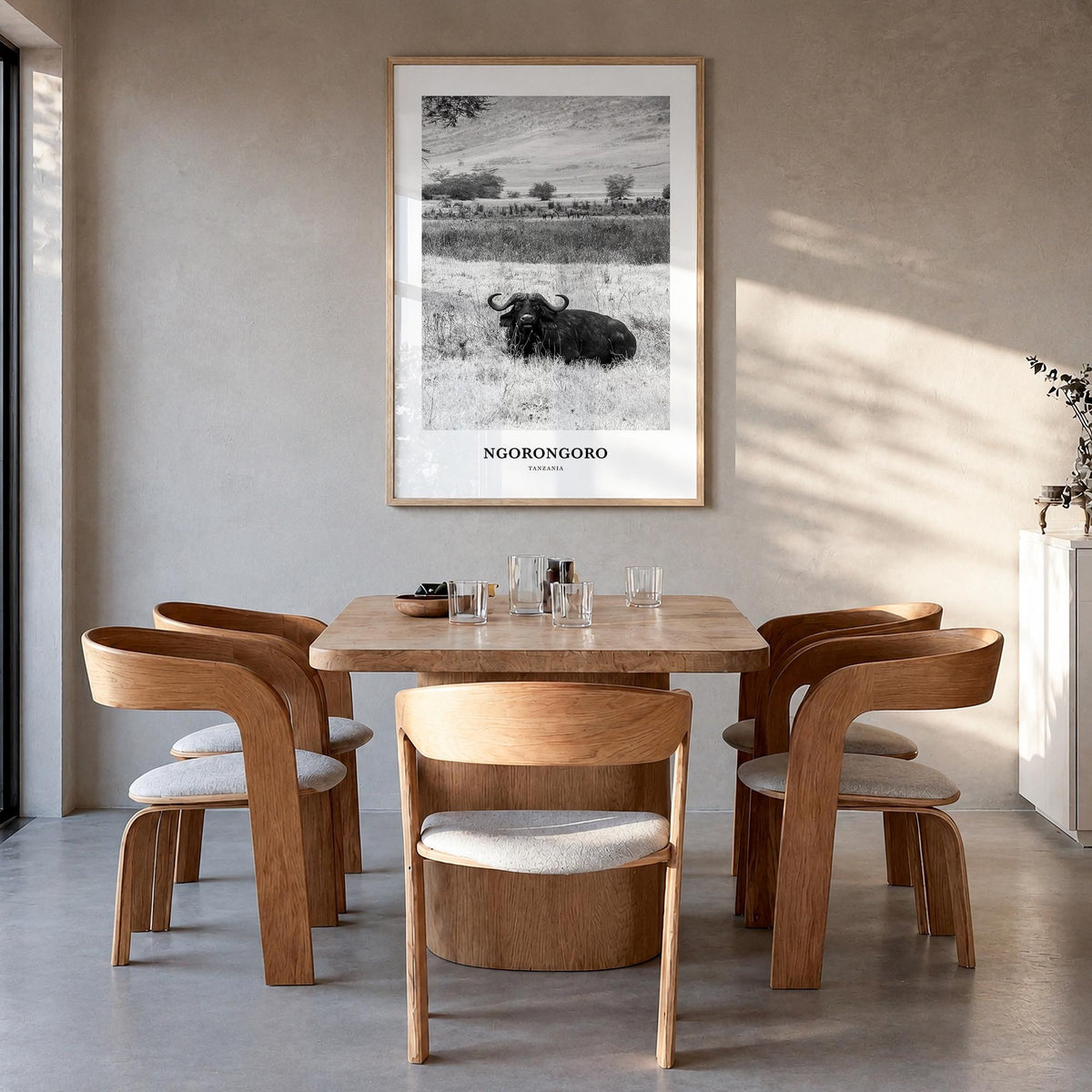 Ngorongoro black & white classic poster of Tanzania – vertical wall art in natural wood frame, hanging on wall