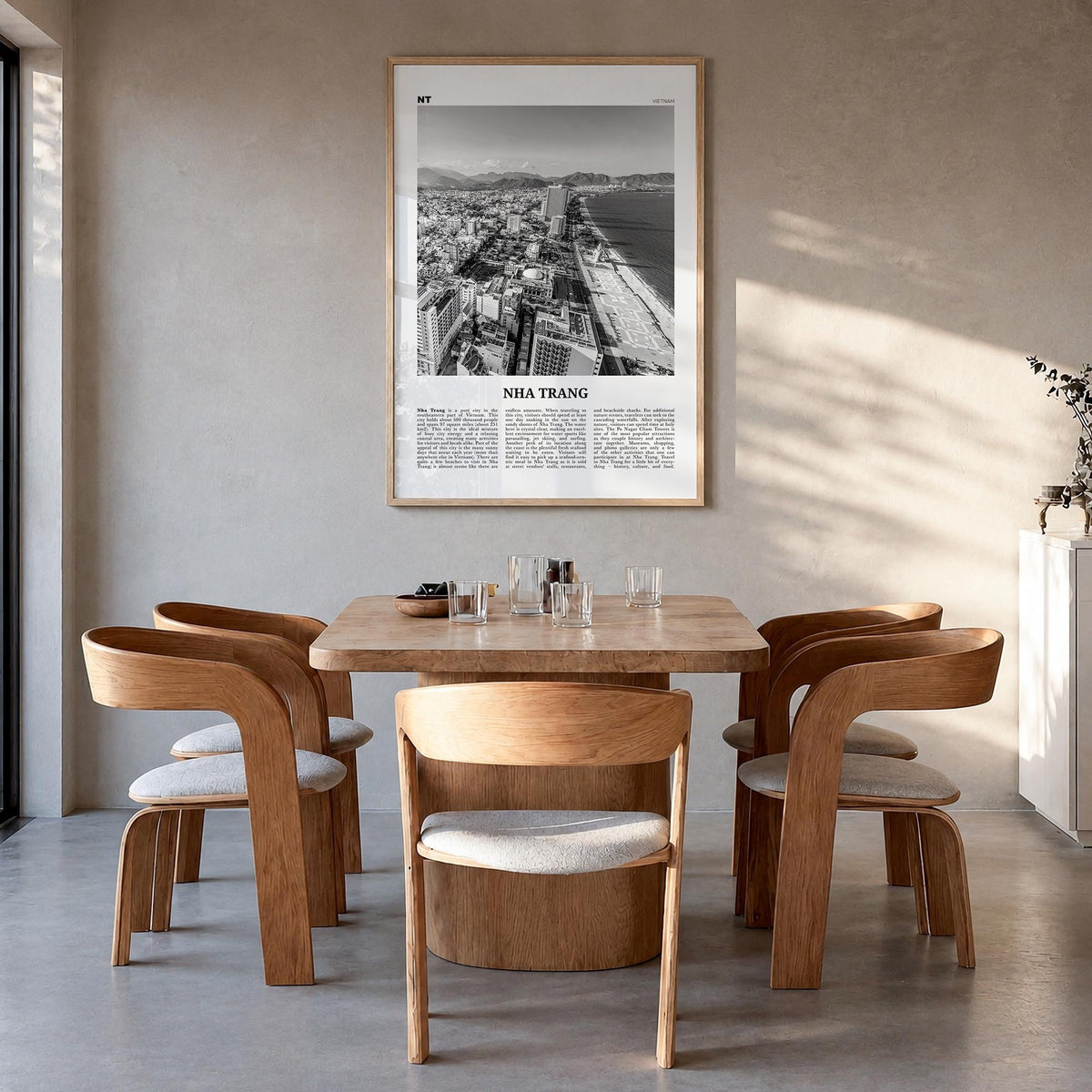 Nha Trang black & white newspaper poster of Vietnam – vertical wall art in natural wood frame, hanging on wall