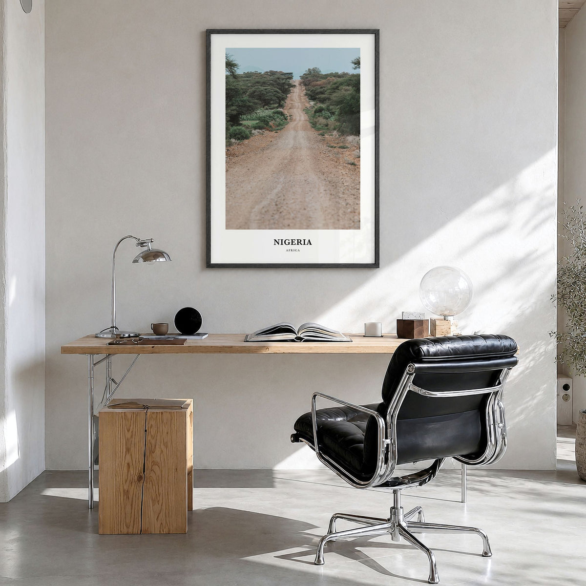 Nigeria Classic Poster in a black wood frame, hanging in a bright home office