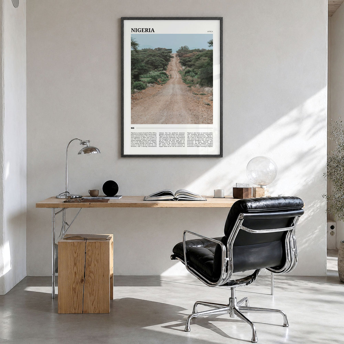 Nigeria Travel Poster in a black wood frame, hanging in a bright home office