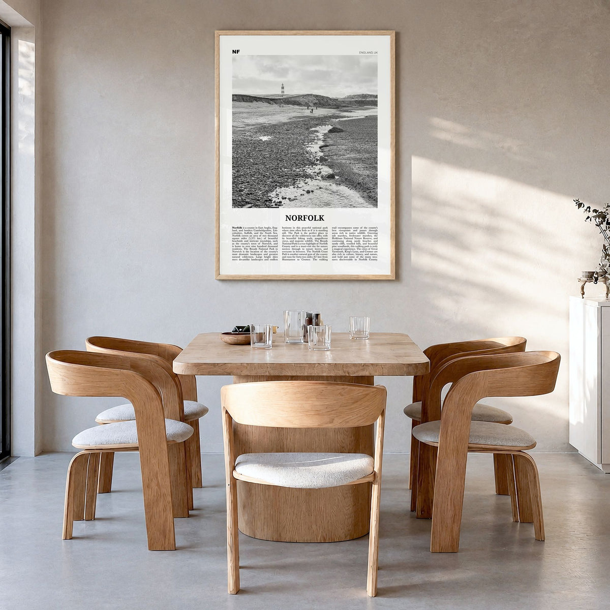 Norfolk, England Newspaper Poster in a natural wood frame, hanging in a dining room