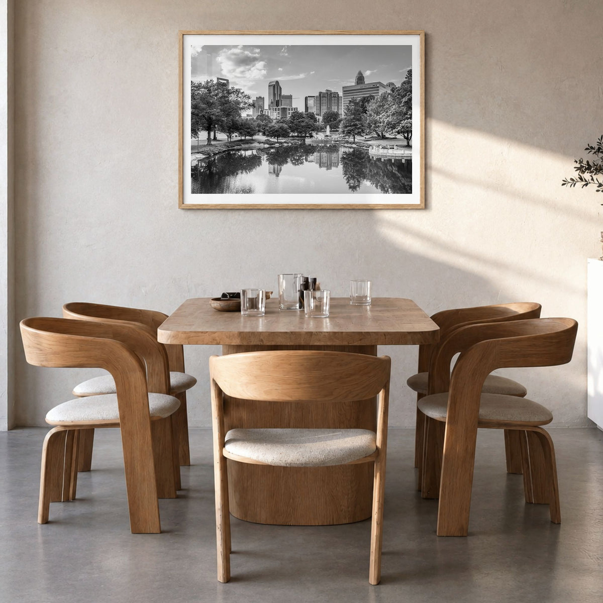 North Carolina Photo Poster in a natural wood frame, hanging in a dining room, white border