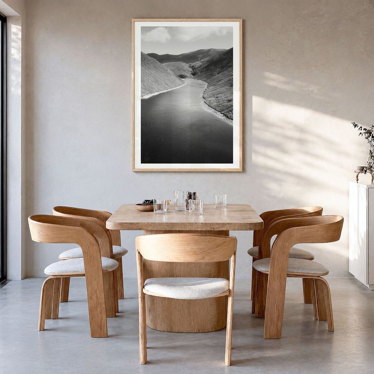 Northern Ireland Photo Poster in a natural wood frame, hanging in a dining room, white border
