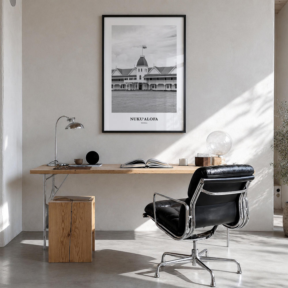 Nuku'alofa black & white classic poster of Tonga – vertical wall art in black wood frame, hanging on wall
